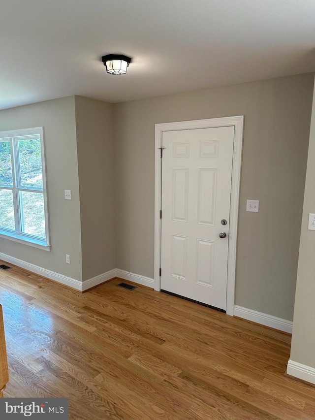 foyer entrance featuring light hardwood / wood-style floors