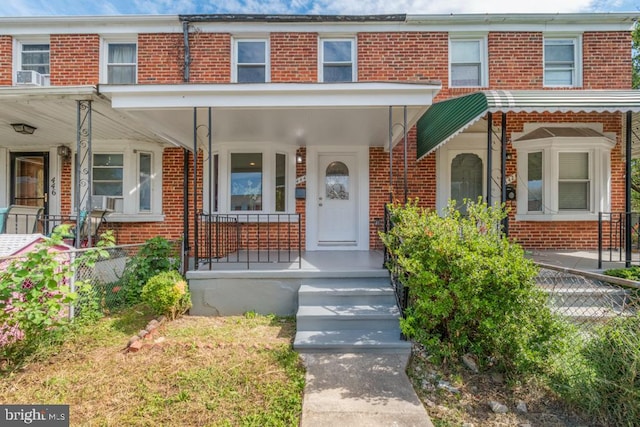 multi unit property with cooling unit and covered porch