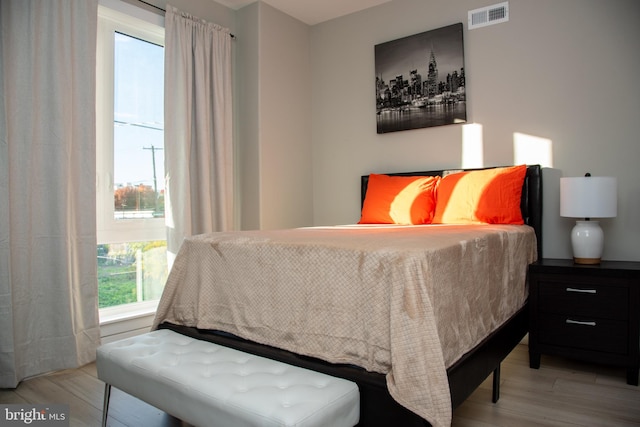 bedroom featuring light wood-type flooring