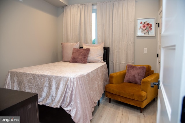 bedroom featuring light wood-type flooring