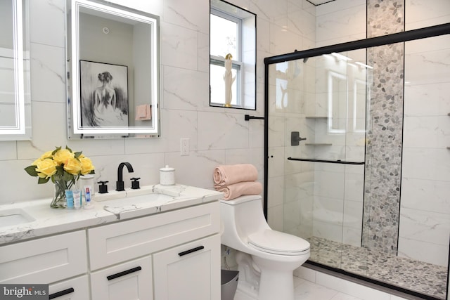 bathroom with an enclosed shower, tile patterned flooring, toilet, and tile walls