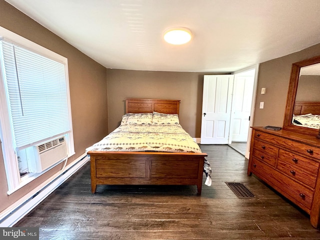 bedroom featuring a baseboard radiator, dark wood-type flooring, and cooling unit