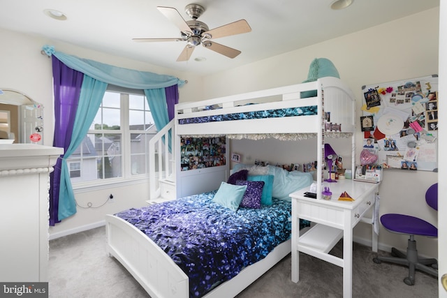 bedroom featuring ceiling fan and carpet flooring