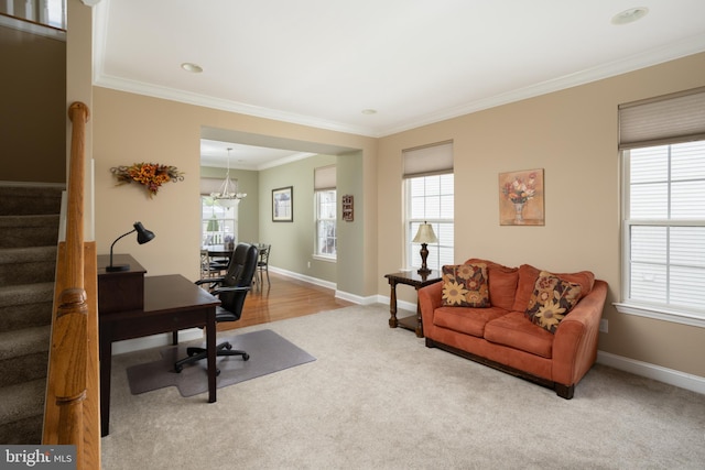 office area featuring crown molding, an inviting chandelier, and light carpet