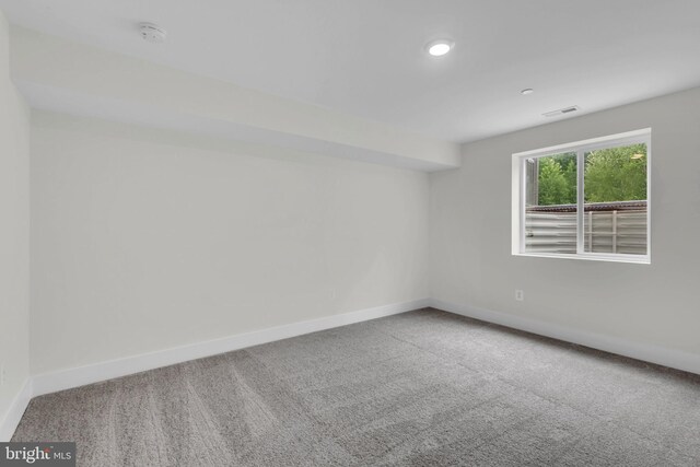 view of carpeted spare room