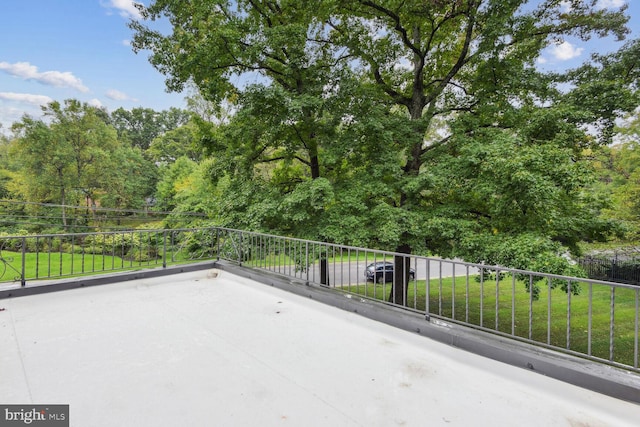 view of patio with a balcony