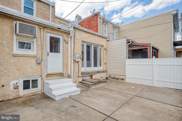 back of house with a patio