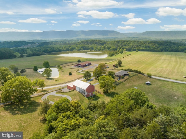 birds eye view of property with a rural view and a water and mountain view