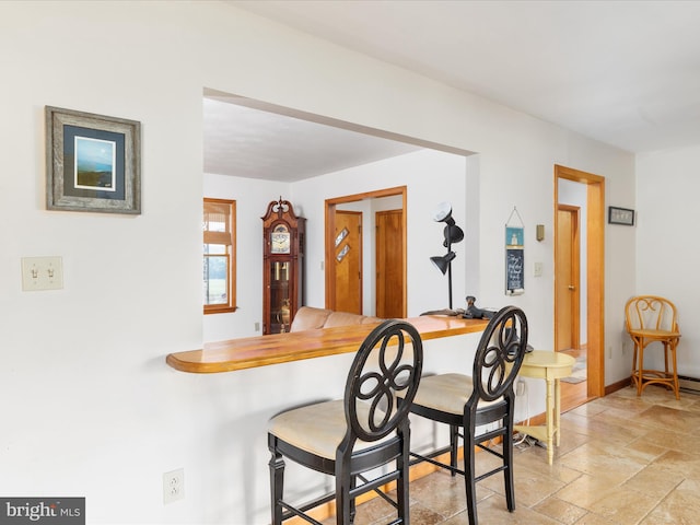 kitchen with a kitchen bar