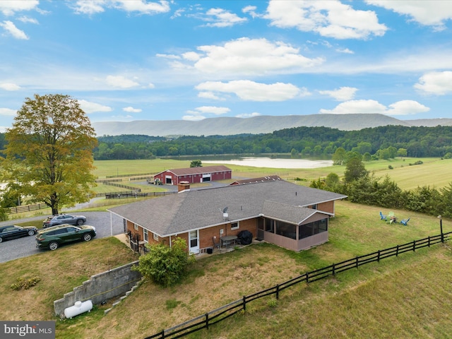 bird's eye view featuring a water and mountain view and a rural view