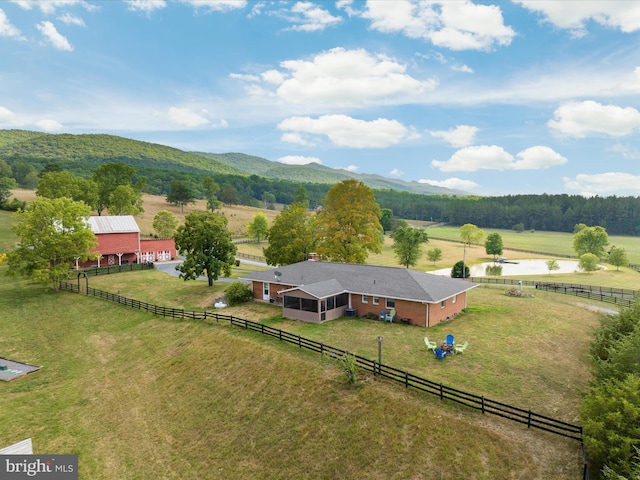 aerial view with a mountain view and a rural view