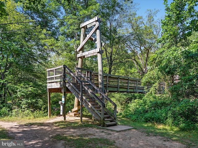 view of jungle gym with a wooden deck