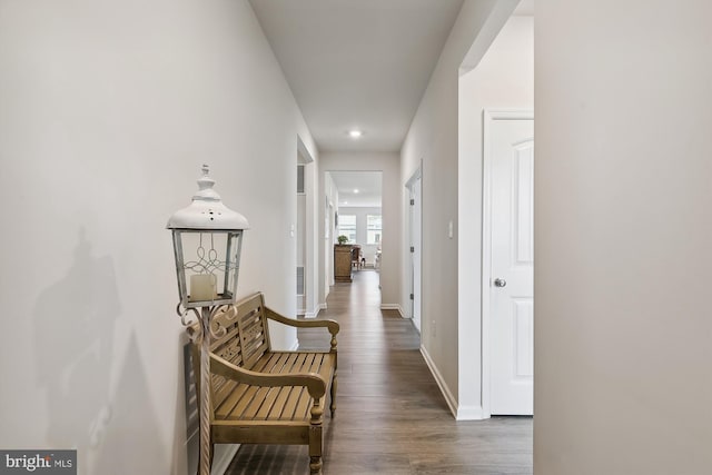 corridor featuring dark wood-type flooring