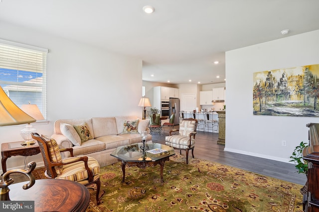 living room featuring dark hardwood / wood-style floors