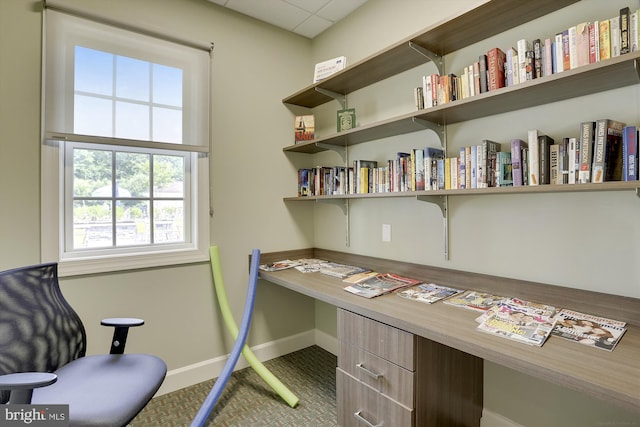 office area with built in desk