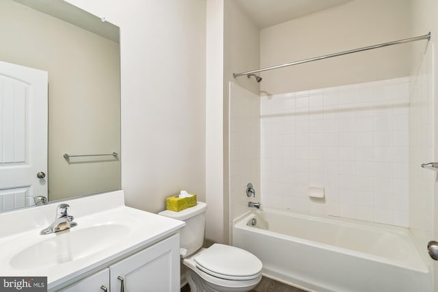 full bathroom with vanity, shower / tub combination, and toilet