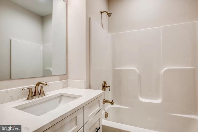 bathroom with shower / bath combination and vanity