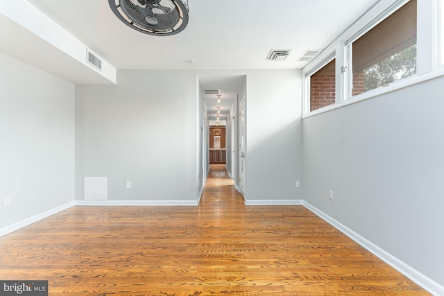 spare room featuring hardwood / wood-style flooring