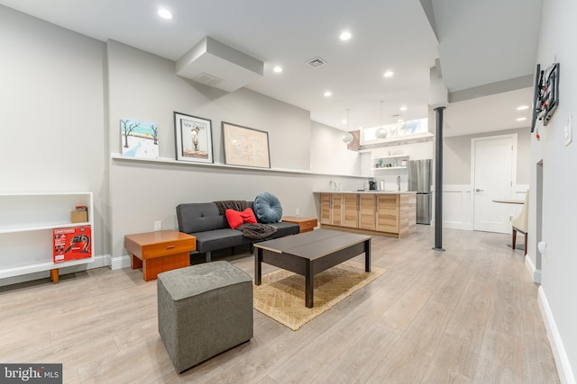 living room with light wood-type flooring