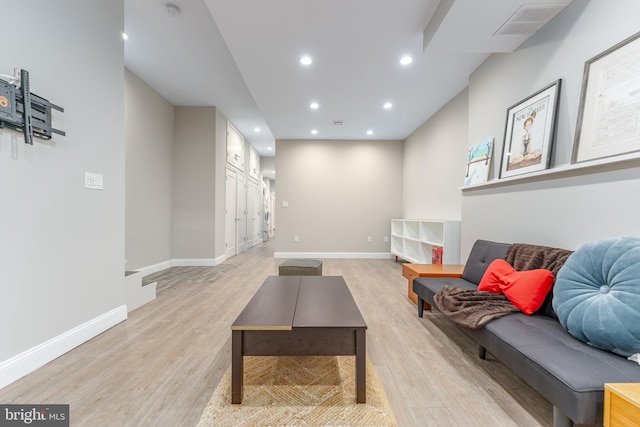 living room with light hardwood / wood-style floors