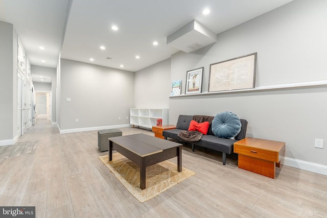 living room with light hardwood / wood-style floors