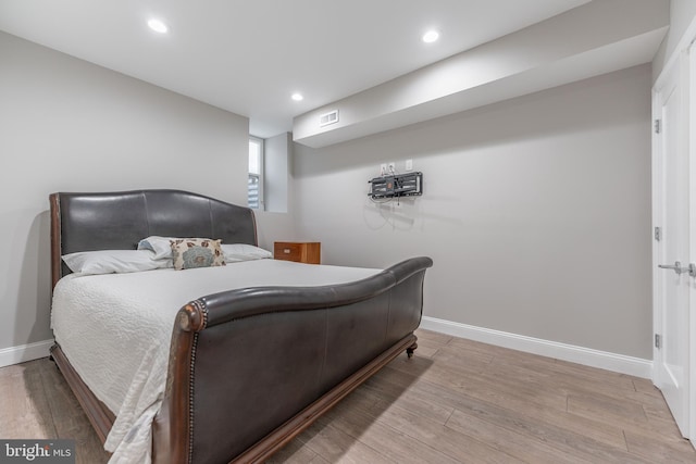 bedroom featuring light hardwood / wood-style floors