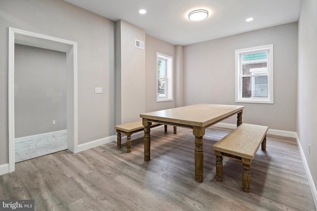 dining space featuring visible vents, recessed lighting, baseboards, and wood finished floors