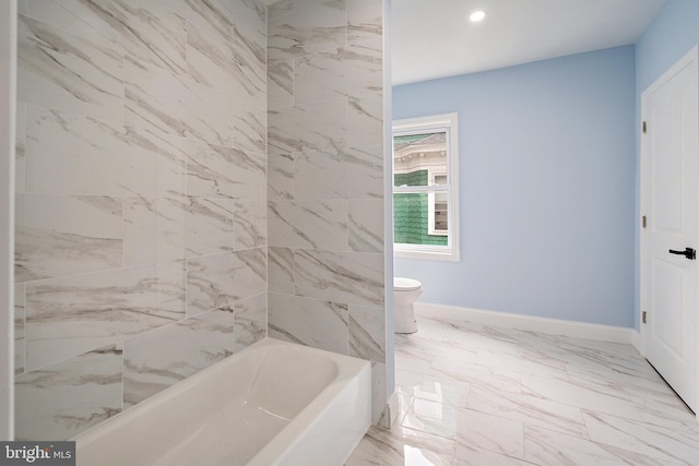 bathroom featuring recessed lighting, marble finish floor, toilet, and baseboards