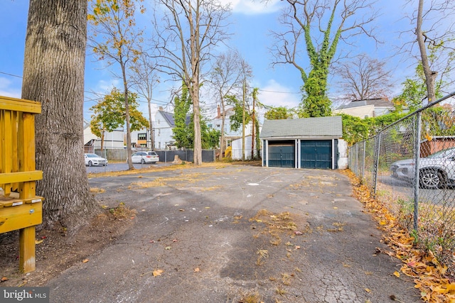 exterior space with aphalt driveway