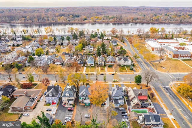 birds eye view of property featuring a residential view and a water view