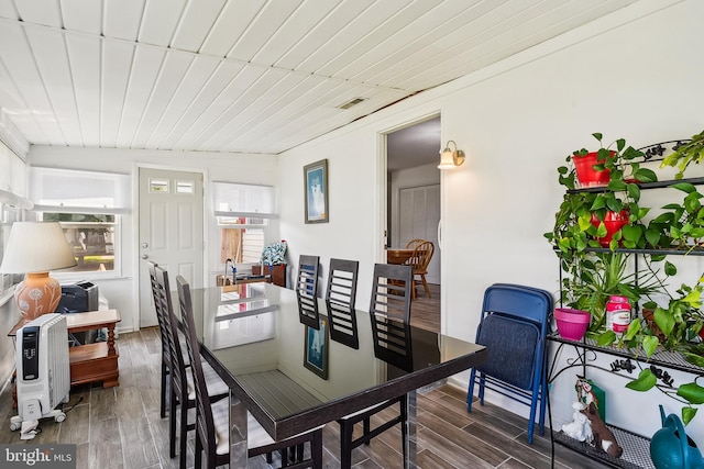 dining room featuring dark hardwood / wood-style flooring