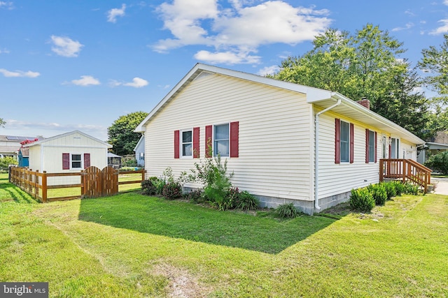 view of property exterior featuring a yard