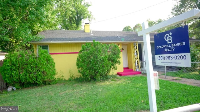 exterior space featuring a front lawn