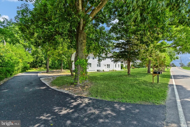 exterior space featuring a front lawn