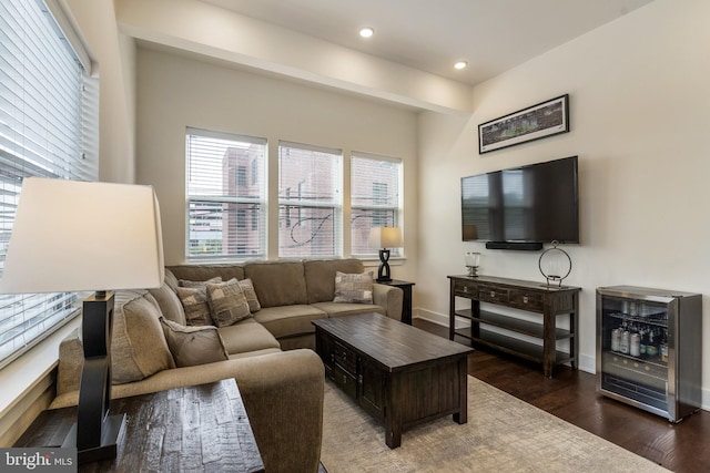 living room featuring dark hardwood / wood-style flooring and beverage cooler