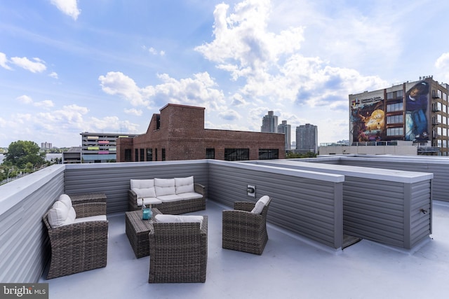 view of patio featuring outdoor lounge area and a balcony