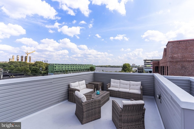 view of patio featuring outdoor lounge area and a balcony