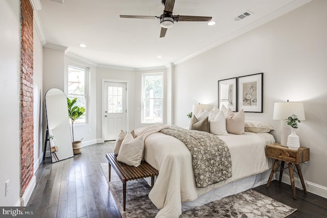 bedroom with ornamental molding, ceiling fan, and dark hardwood / wood-style flooring