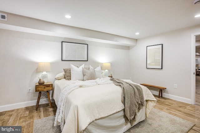 bedroom featuring light hardwood / wood-style floors