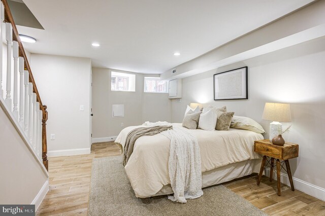 bedroom featuring light wood-type flooring