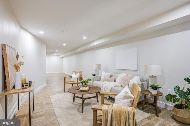 living room with light hardwood / wood-style flooring