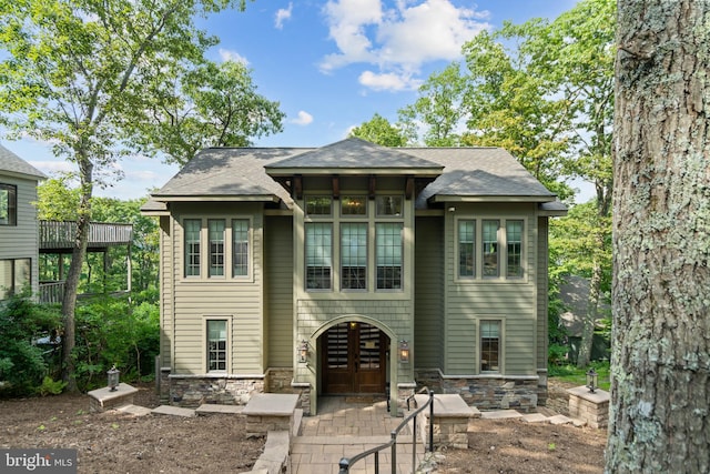 view of front of home with a balcony