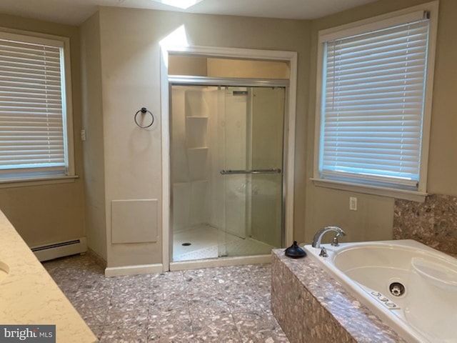 bathroom featuring a baseboard radiator, vanity, and plus walk in shower