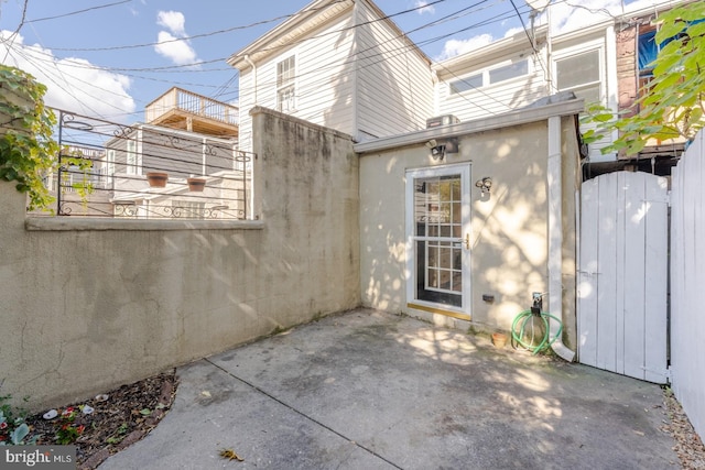 doorway to property featuring a patio area