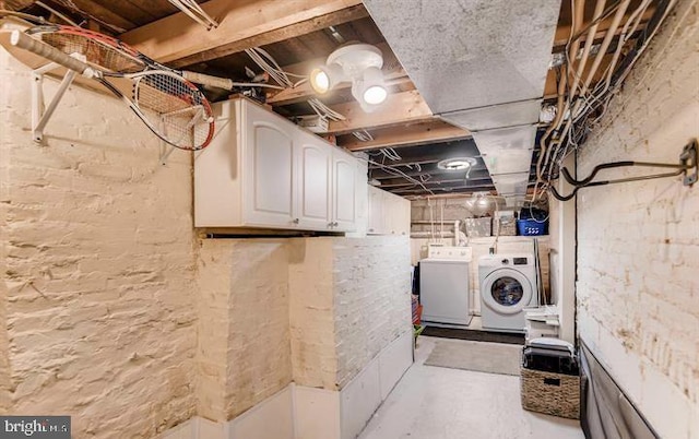 basement with washing machine and clothes dryer