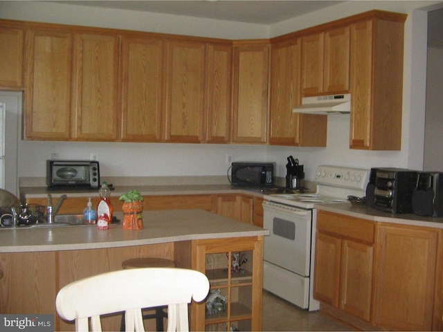 kitchen featuring white electric range