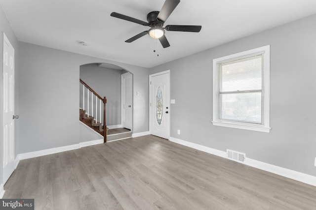 entryway with light hardwood / wood-style flooring and ceiling fan