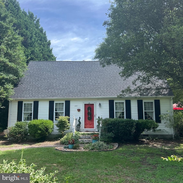 ranch-style home with a front lawn