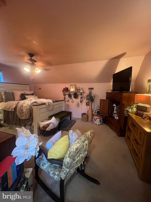 carpeted bedroom featuring ceiling fan and lofted ceiling