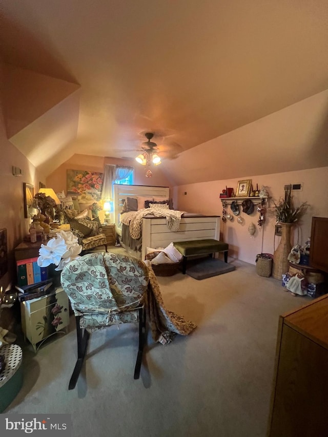 bedroom featuring vaulted ceiling, carpet flooring, and ceiling fan